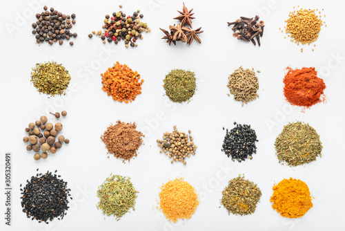 Fototapeta Naklejka Na Ścianę i Meble -  Many different spices on white background