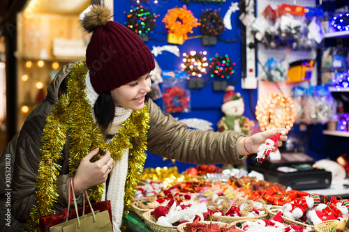 Nice teen girl with Christmas decoration