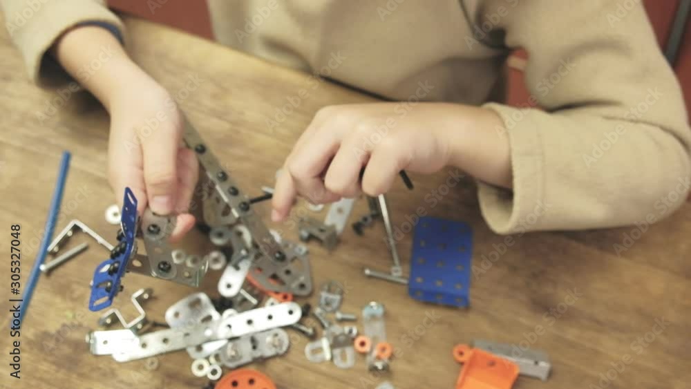 Boy child mechanical toy diy screwdriver tools, studying. Boy child mechanical toy diy screwdriver tools, studying.