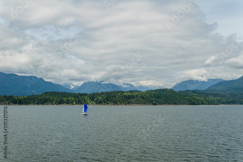 ocean and mountains view from ferry Howe Sound near Gibsons Canada. © olegmayorov