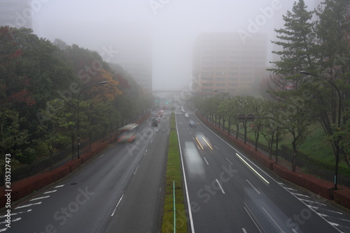 Tokyo,Japan-November 25, 2019: Foggy street at the suburb of Tokyo in the morning