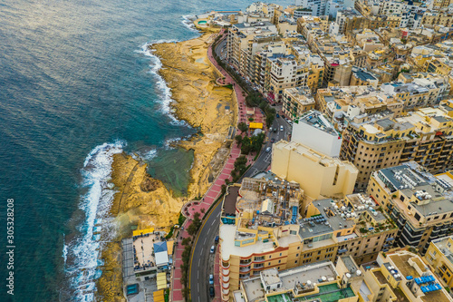 Aerial view of Sliema city. Winter, sea, seafront, road. Malta 
