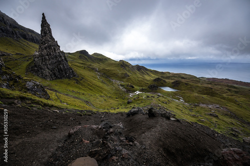 Old Man of Storr on the Isle of Skye in Scotland. Mountain landscape with foggy clouds.
