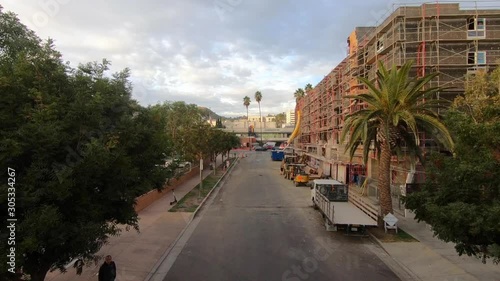 Slow Motion Push towards Sunset Boulevard by Construction Site in Hollywood photo