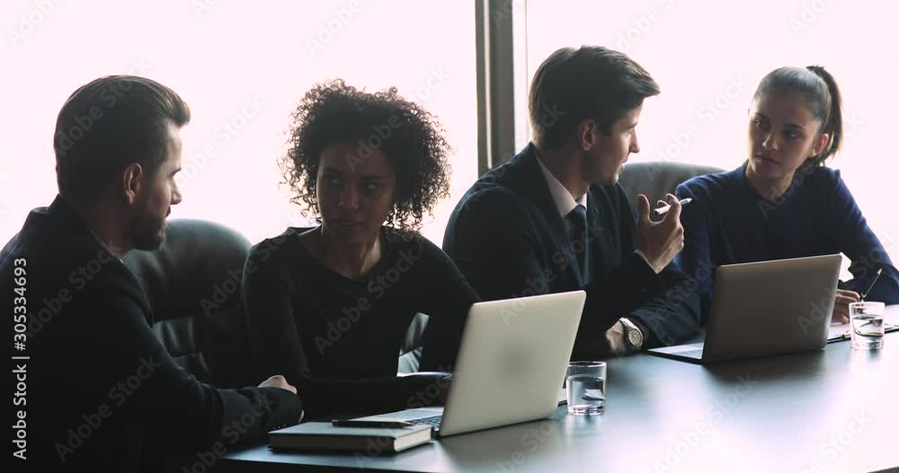 Diverse business people executives talk share ideas at conference break Diverse business people executives talk share ideas at conference break