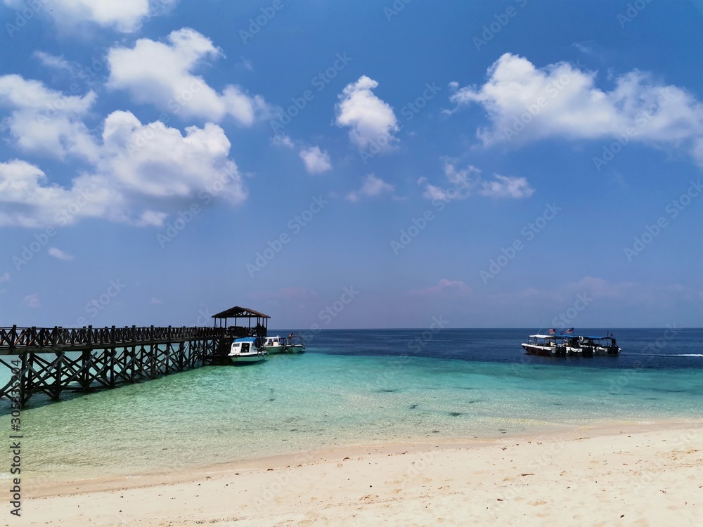 Beautiful blue sky and crystal clear water in Sipadan Island, Semporna. Sabah, Malaysia. Borneo. The Land Below The Wind.