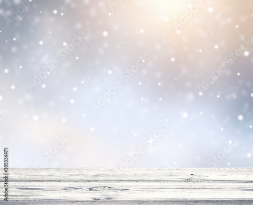 Snow falling on light silver flare defocused 3d background. Wonderful blur winter illustration. Old white empty table wooden texture. 