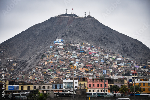 Canvas Print Lima, Peru - Nov 19, 2019: Colorful buildings on the slopes of Cerro San Cristob