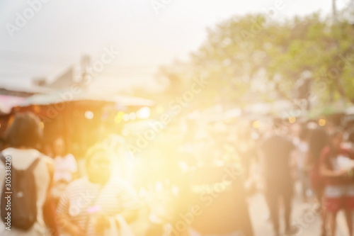 Blur of people and environment at weekend market background