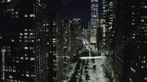 flying over night street in manhattan downtown