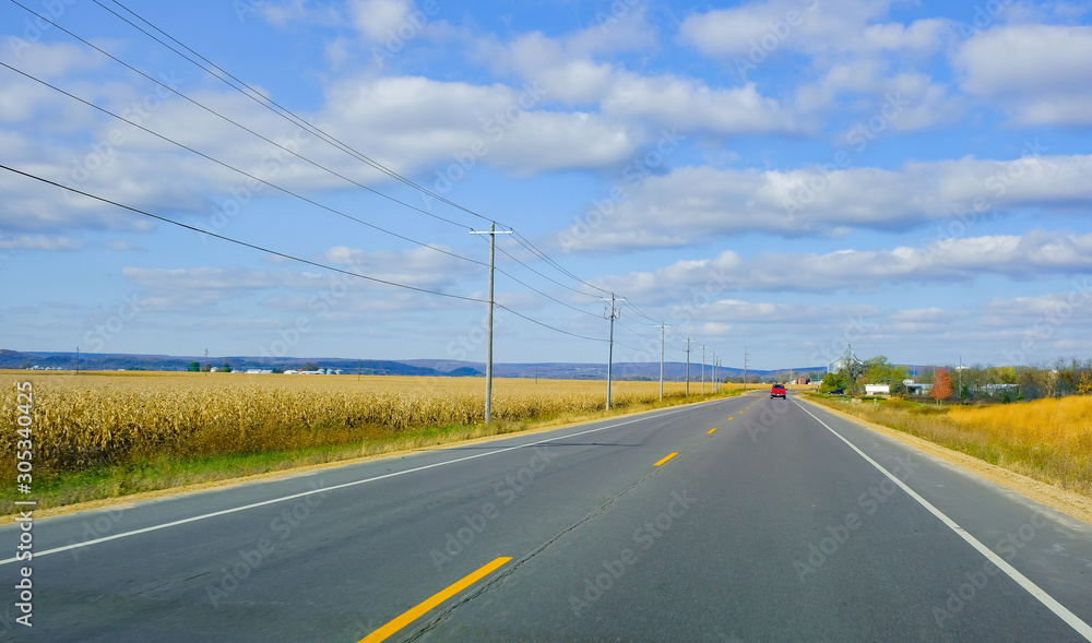 Road trip, Countryside Road autumn season in Wisconsin State Park, USA