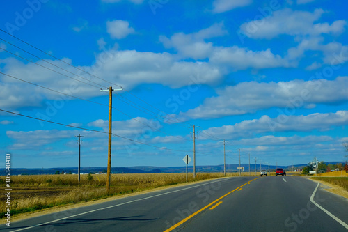 Road trip, Countryside Road autumn season in Wisconsin State Park, USA