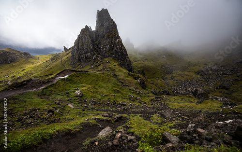 Old Man of Storr on the Isle of Skye in Scotland. Mountain landscape with foggy clouds.