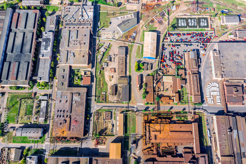 Wallpaper Mural aerial panoramic view of city industrial district. industrial buildings of manufacturing companies with rusty roofs Torontodigital.ca