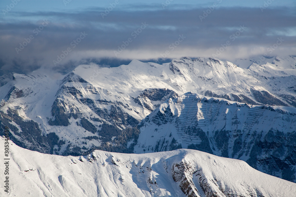 amazing snow covered peaks in the Swiss alps Jungfrau region from Schilthorn