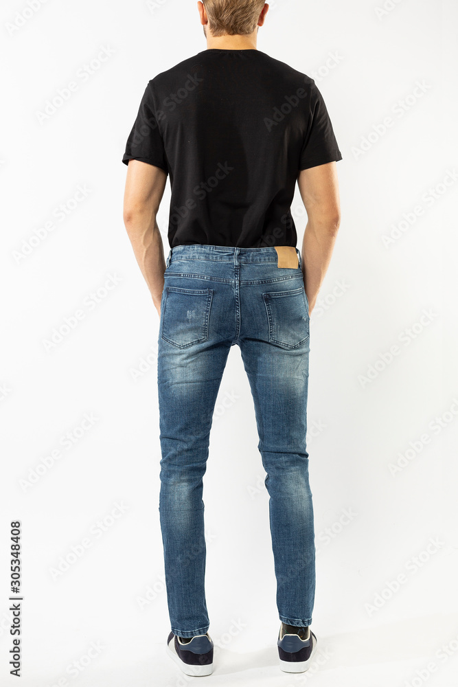 man in jeans, denim pants close up on white background, blue jeans, blue t-shirt man in jeans, denim pants close up on white background, blue jeans, blue t-shirt