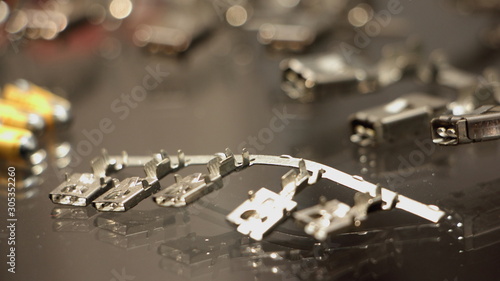Car electric clamp connector pins close up © Ilya