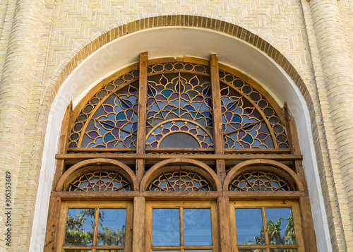 Renovated wooden arch window, Masoudieh historic mansion from Qajar dynasty, built in 1879, Tehran, Iran photo