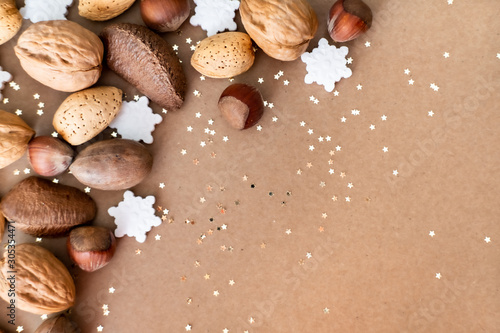 Christmas decorations and nuts background.