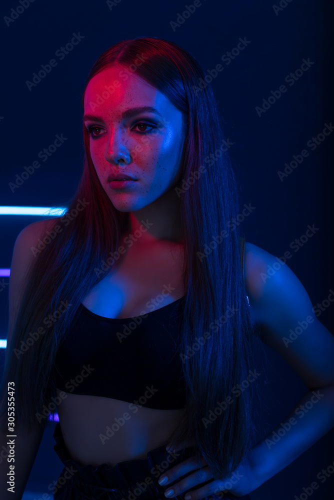 Studio portrait of a beautiful attractive athletic slim gir. Studio portrait of a beautiful attractive athletic slim gir.