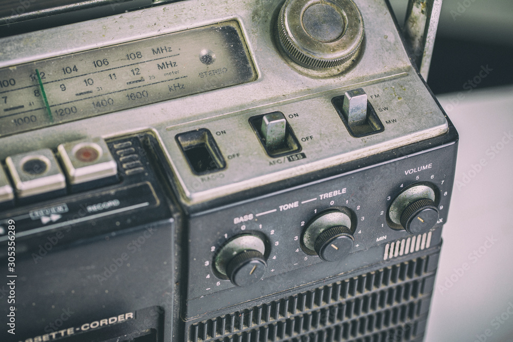 Fototapeta premium Close-up playback control buttons on audio cassette player.- Old radio receiver. retro technology 1980s. 