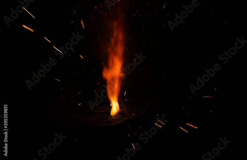 Beautiful Diwali Glowing Firecracker, fire of cracker explosion on black background