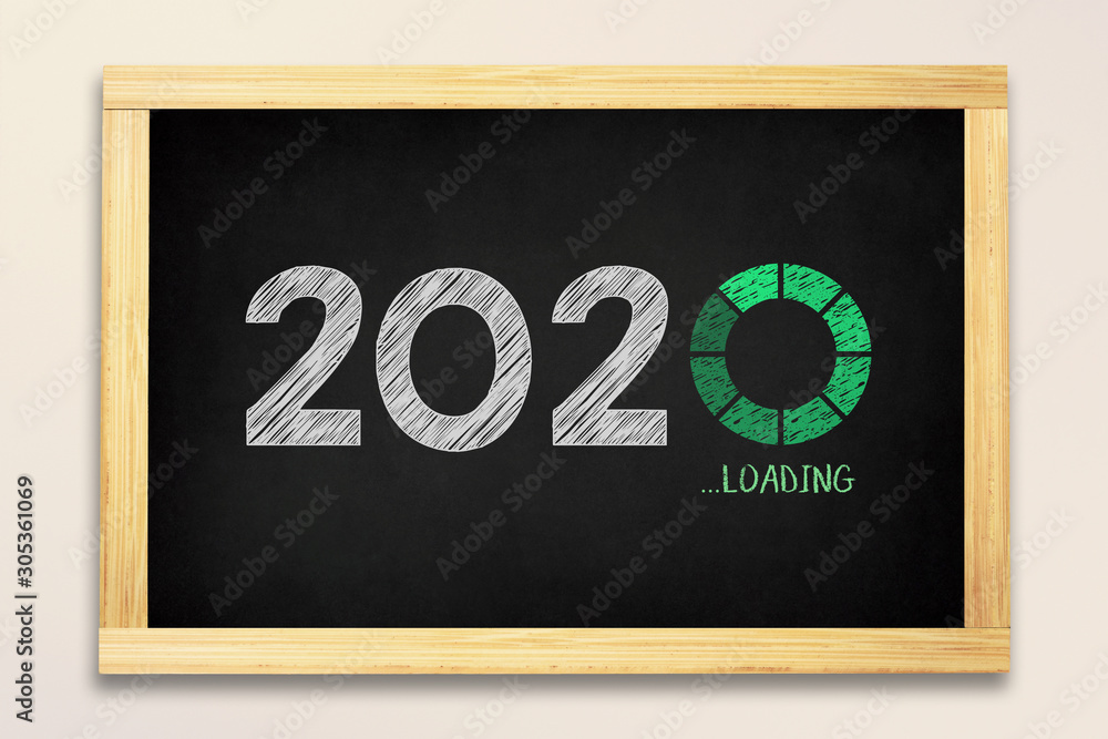 Loading New Year 2020 Concept on Chalkboard Loading New Year 2020 Concept on Chalkboard