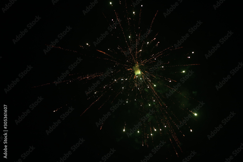 Beautiful fire crackers or fireworks in the sky. celebrating new year and Christmas and Diwali Beautiful fire crackers or fireworks in the sky. celebrating new year and Christmas and Diwali