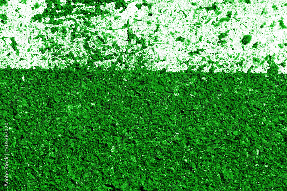 Old asphalt surface with white paint close-up, top view. Abstract background. Green color toned Old asphalt surface with white paint close-up, top view. Abstract background. Green color toned