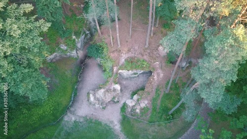 Devil's Oven or Large Ellite Natural Geological Monument  Located in the Gauja National Park at Lode Behind Cesis in Latvia. Licu – Langu Sandstone Cliffs Liepa Cave. Aerial Dron Shoot. photo