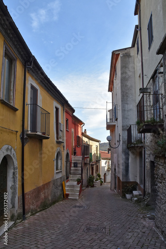 Civitanova del Sannio, 11/23/2019. A narrow street among the old houses of a mountain village in the Molise region © Giambattista