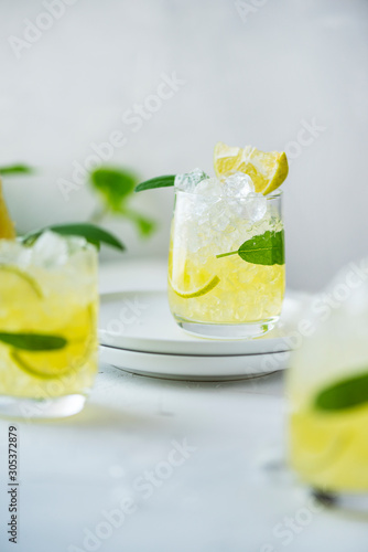 Summer cocktail with sage and lime