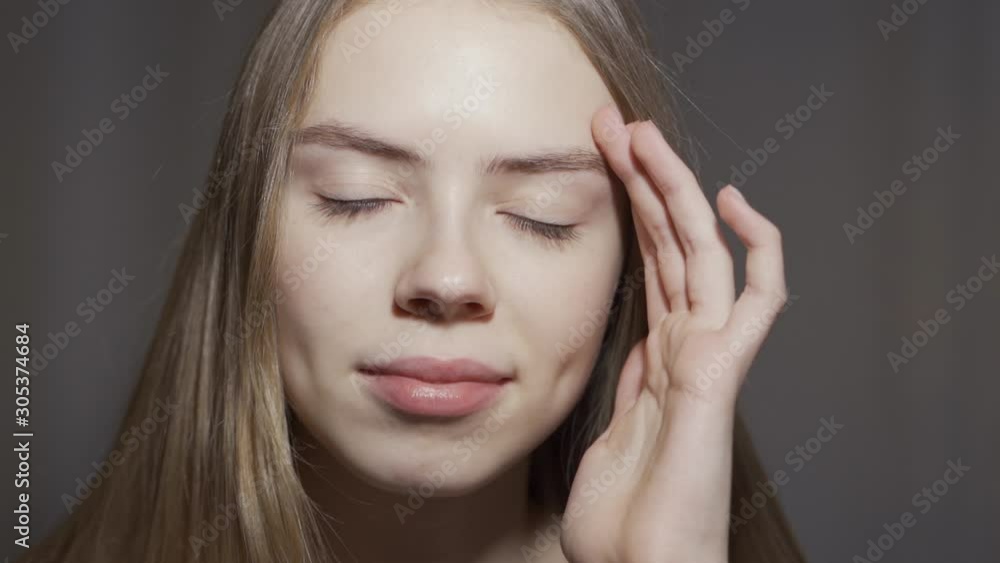 Close-up of beautiful gray female eyes. The girl opens her eyes Close-up of beautiful gray female eyes. The girl opens her eyes