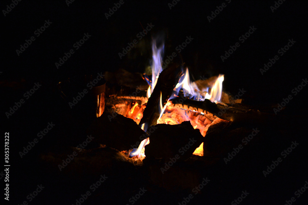 Closeup of blazing campfire coals in the evening Closeup of blazing campfire coals in the evening
