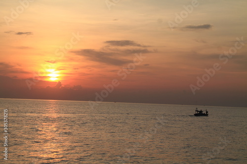 sunset at sea © Pichit