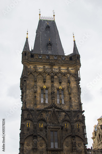 Vertical picture of Powder Tower (Prašná brána), a medieval gothic city gate and one of the most significant monuments in Prague, Czech Republic, located in the Republic Square (Náměstí Republiky)