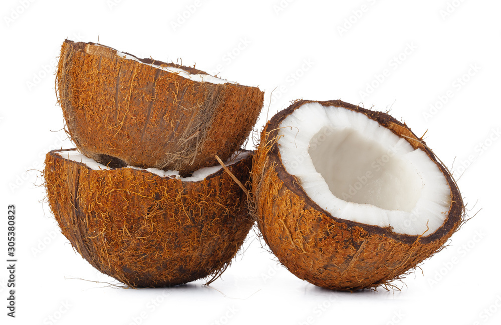 close up of a coconut craked into pieces close up of a coconut craked into pieces