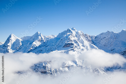Fototapeta Naklejka Na Ścianę i Meble -  amazing snow covered peaks in the Swiss alps Jungfrau region from Schilthorn