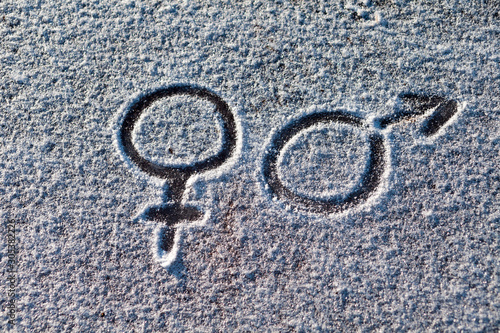 The symbols of gender in the snow. © Larisa