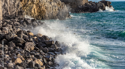 Reef breakwater in protection at coast photo