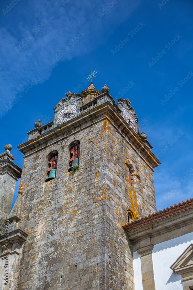 Detailed view at the tower on front facade of the Cathedral of Viseu, Adro da Se Cathedral de Viseu, architectural icon of the city of Viseu