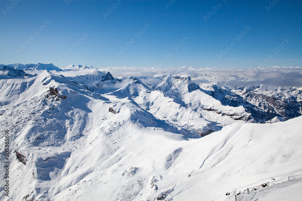 amazing snow covered peaks in the Swiss alps Jungfrau region from Schilthorn