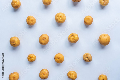 View from above of Yellow potatoes on white background