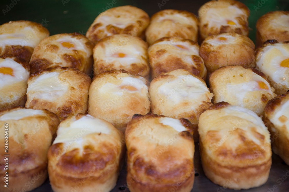 Korean street food in Hongdae. It's bread with egg flied at the market. Korean street food in Hongdae. It's bread with egg flied at the market.