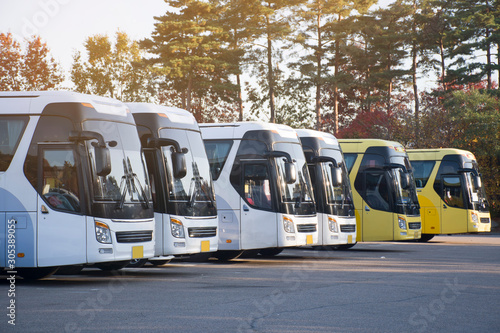 New bus fleet is parking at the parking yard for service passengers. photo