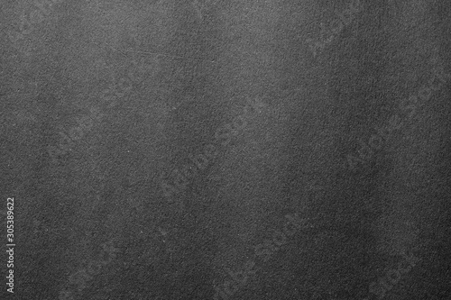 Gray color cardboard. Clean light grey paper texture. High resolution photo.