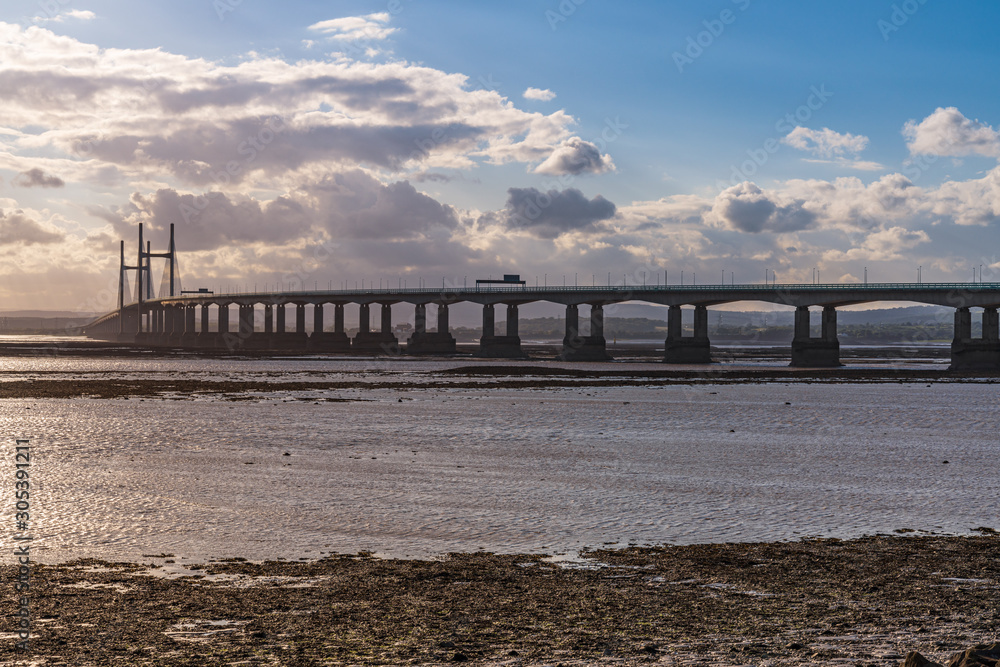 The Prince of Wales Bridge, leading the M4 over the River Severn, seen from Severn Beach, South Gloucestershire, England, UK