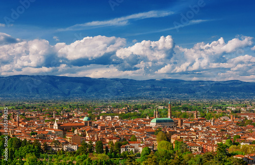 Panoramic view of Vicenza historic center with the famous renaissance Basilica Palladiana and nearby mountains, from Mount Berico terrace photo