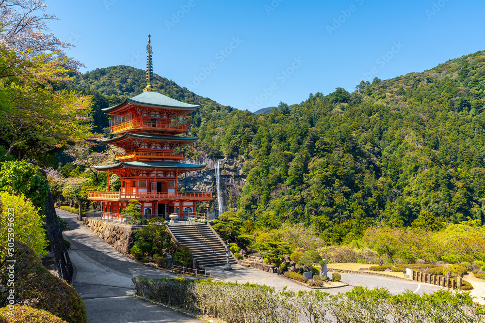 Beautiful famous landmark waterfall Nachi Falls in green forest blue sky Nachikatsuura Wakayama Prefecture Japan Nachi Fall is one of the best waterfalls in Japan idea for rest relax enjoy lifestyle Beautiful famous landmark waterfall Nachi Falls in green forest blue sky Nachikatsuura Wakayama Prefecture Japan Nachi Fall is one of the best waterfalls in Japan idea for rest relax enjoy lifestyle