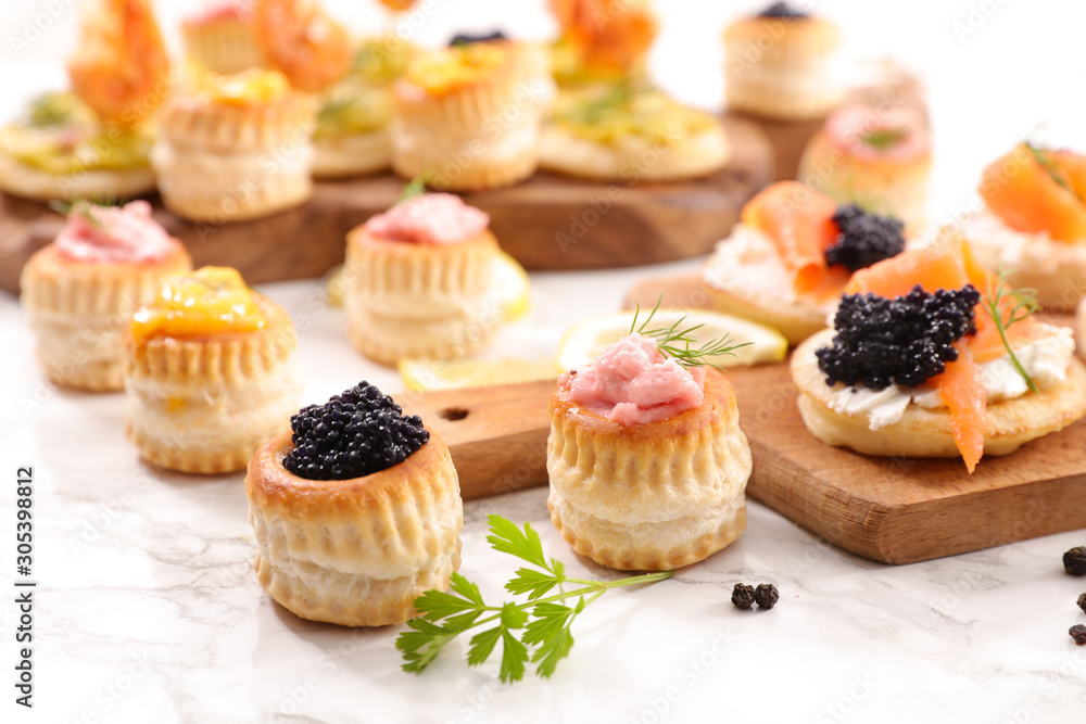 festive canape with caviar and salmon fish festive canape with caviar and salmon fish